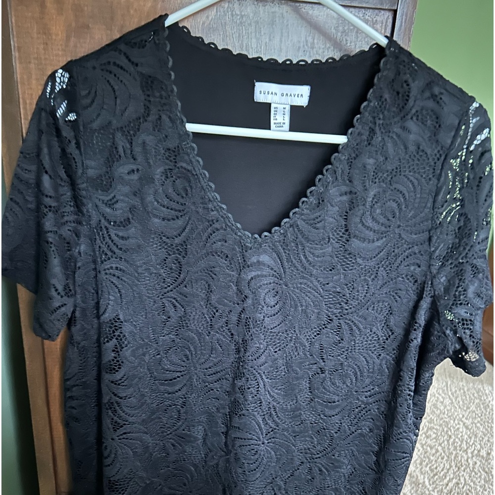 Susan Graven black lace top with black underlay.